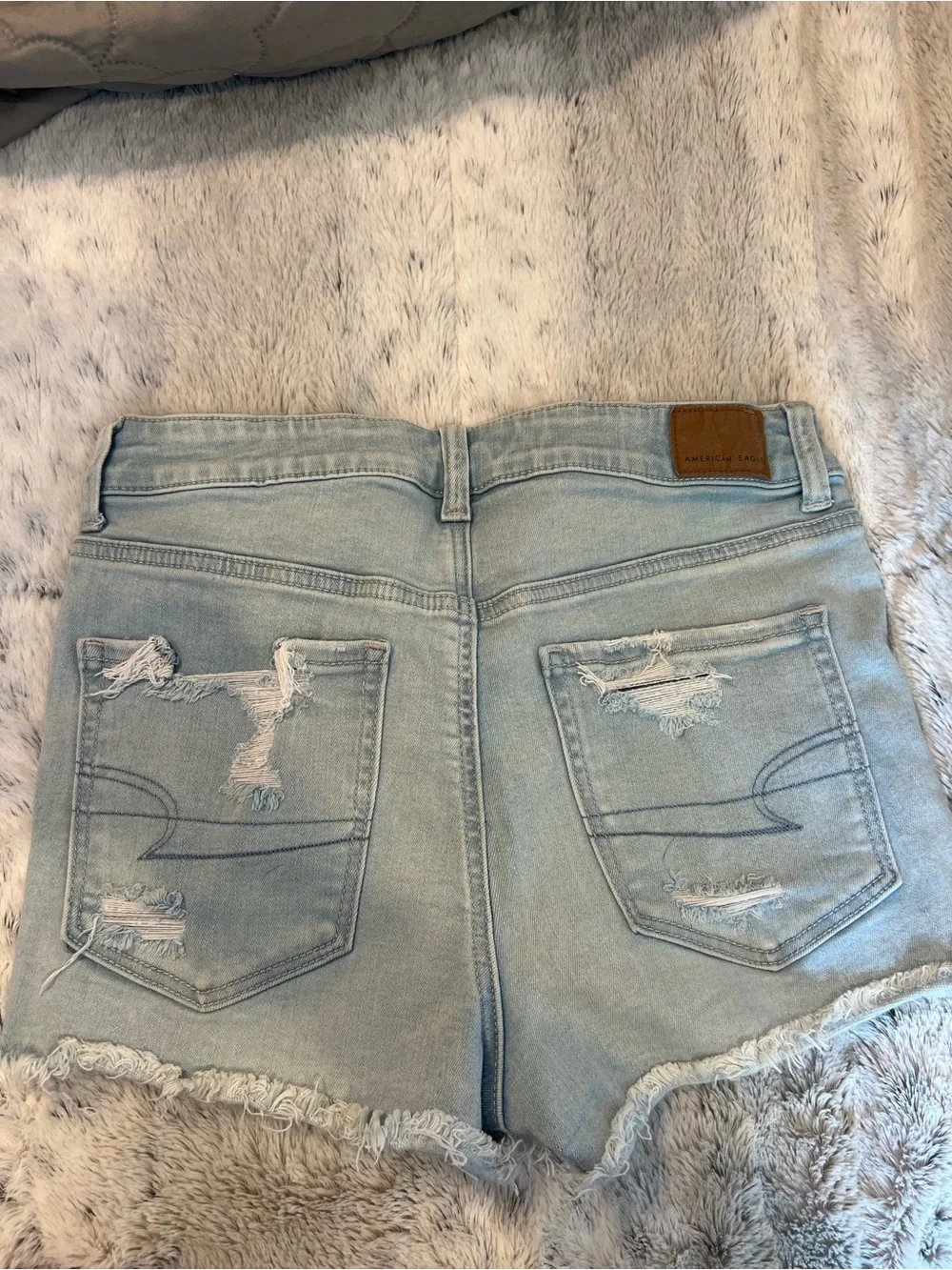 American Eagle Outfitters Nexxt Level Stretch Light Blue Distressed Denim Shorts